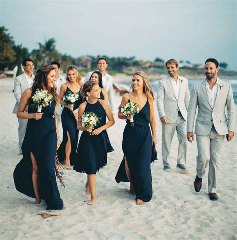 Beach Wedding Bridesmaids In Navy Blue Dresses And Groomsmen In Grey Suits Beach Wedding