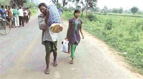 Watch Denied Vehicle Odisha Man Carries Wifes Body On Shoulders For 12 Km India News The