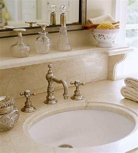 If your bathroom is too small for shelves with a lot of depth, add extra storage by placing a tray over the hamper. Our Favorite Dream Bathrooms | Decorative shelves, Sinks ...