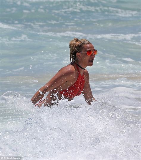 Britney Spears Shows Off Her Figure In A Red Bikini Daily Mail Online