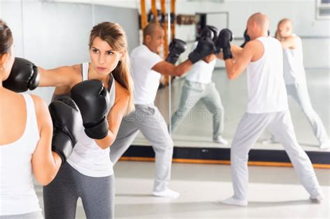 Two Women Boxing Sparring In The Gym Stock Photo Image Of Gloves