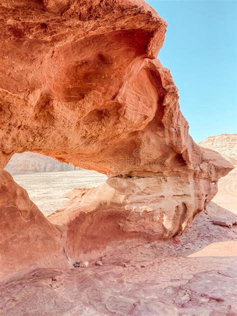 A View Over Wadi Rum Desert Looking Through An Arch Jordan Stock