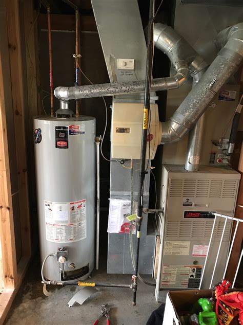 How to test a thermocouple's voltage using a multimeter. Honeywell gas control valve troubleshooting for Water Heaters