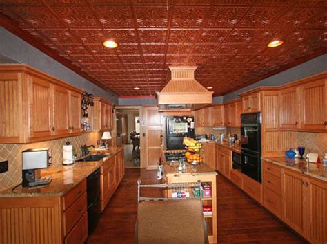 The redesign of this kitchen included hiding the ugly popcorn material previously visible first thing when entering the room. 16 Decorative Ceiling Tiles for Kitchens (Kitchen Photo ...