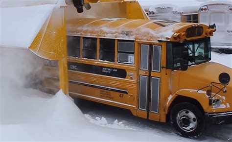 Watch A School Bus Go Through A Snow Blower Video