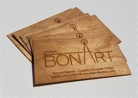 Inks are not 100% opaque, and the wood coloring will show through the printed inks. Wood Business Cards /Business Cards /Laser Engraved Wood