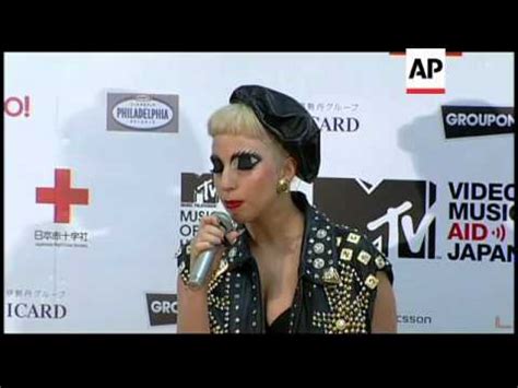 Lady Gaga Keeps Her Eyes Shut During Press Conference YouTube