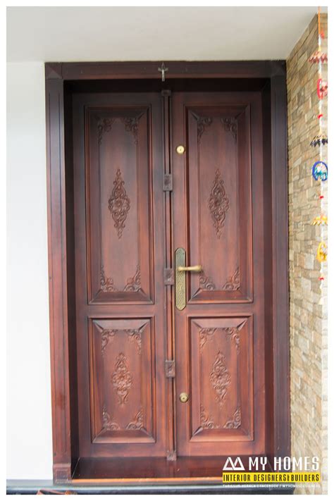 delicate front wooden door designs kerala