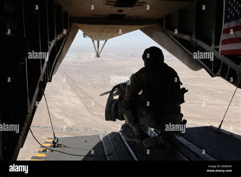 A Us Marine Door Gunner Provides Security From A Ch 53e Super Stallion