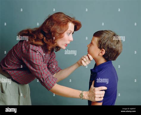 Mother Scolding Her Son Stock Photo Alamy