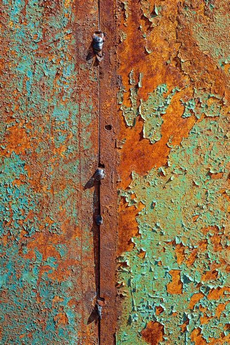 Texture Of Rusty Metal Painted Blue And Green Which Becames Orange