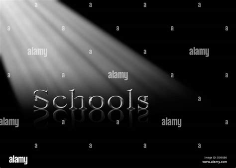 Stone Lettering Of The Word Schools Under A Diagonal Spotlight On A