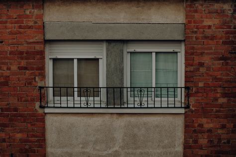 Two Closed Windows Between Walls · Free Stock Photo