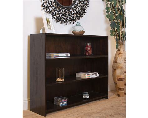 Then wooden shelves can be decorated with books, house plants, collectibles or interesting decor accessories. Indah Dark Low Bookcase - Crafted from high quality ...
