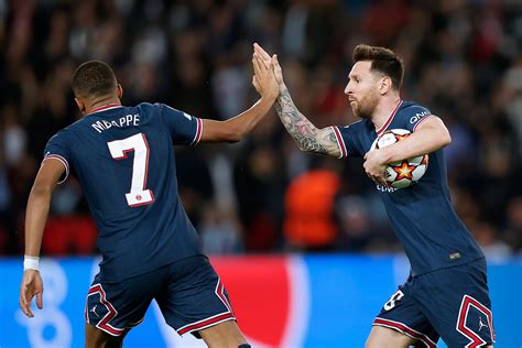 magic of lionel messi and kylian mbappe covers psg s cracks in champions league win over leipzig