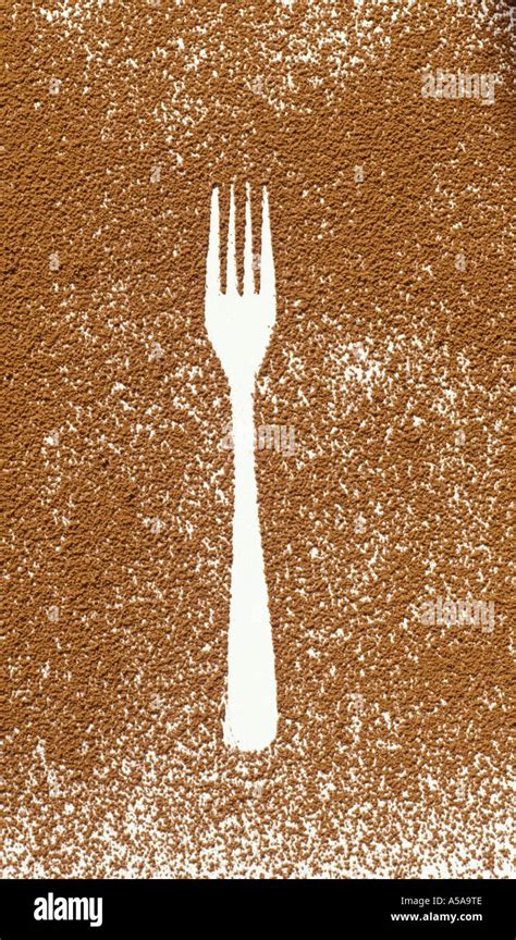 A Fork Shape With Chocolate Powder Stock Photo Alamy