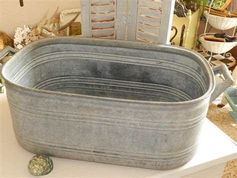 Set of 3 nesting galvanized buckets the largest has a handle and tapered sides, the 2 smaller ones have straight sides the. Vintage Antique Zinc Galvanized Tub with Handles