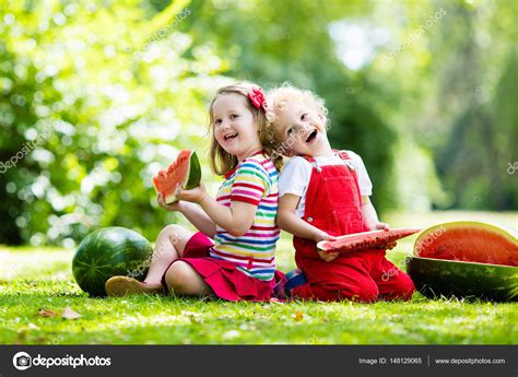 Kids Eating Watermelon In The Garden Stock Photo Image Of Hungry 251
