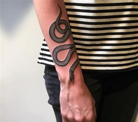 What is it and what is it used for? Mean A Tattoo Snake Does What