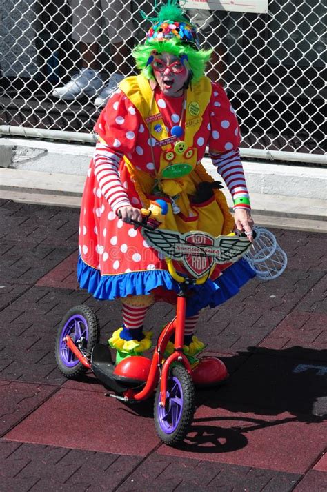 Clown On Bicycle Waves To Crowd At Mendota Parade Editorial Photo