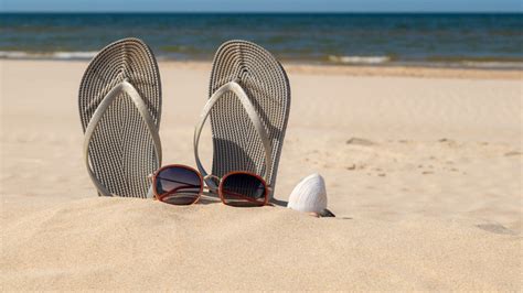 Why You Should Never Wear Socks And Sandals To The Beach