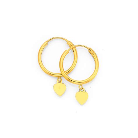 9ct gold 1 5x10mm hoop earrings with heart drop earrings prouds the jewellers