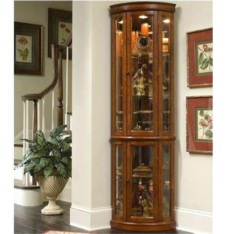 Secure to the wall for. Pulaski Edwardian II Corner Curio Cabinet at Lowes.com