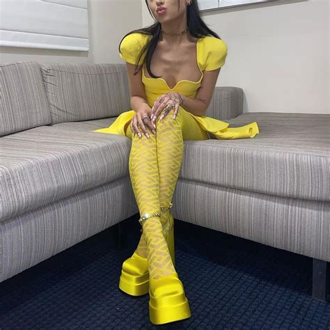 Ariana Grande Wore Sky High Platform Heels With A Minidress Who What Wear