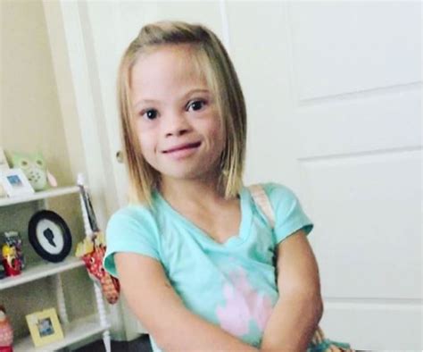See This 7 Year Old Cutie Celebrate Being Down Syndrome