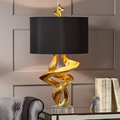 Prop one on a console table to perk up the hallway. Kathy Ireland Tribal Impressions Gold Leaf Table Lamp ...
