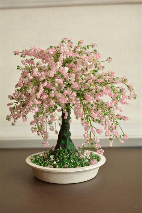 Check out our artificial cherry blossom tree selection for the very best in unique or custom, handmade pieces from our craft supplies & tools shops. Cherry blossom Bonsai trees Sakura beaded bonsai tree Wire ...