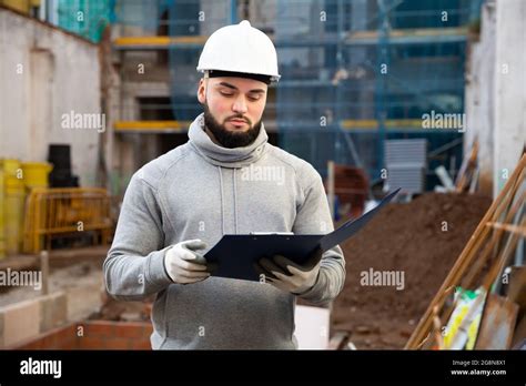 Supervisor Inspecting Process Of Building Overhaul Stock Photo Alamy