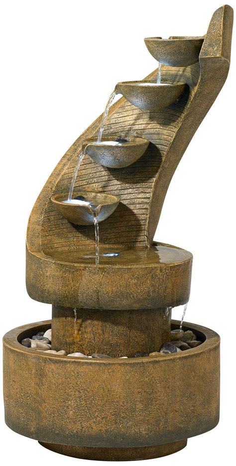 The soft sound of trickling water creates a nearly the modern indoor fountain usually recycles water through an arrangement of containers, using a small electric pump to keep the liquid moving. Modern water fountains indoor | Hawk Haven