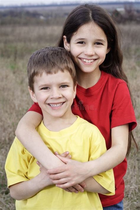 Two Smiling Kids Standing Together Stock Image Image Of Little
