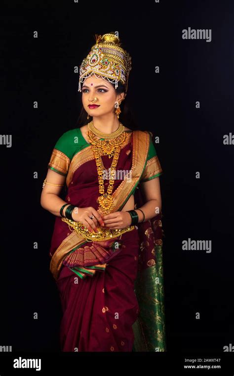 Indian Model Dressed Like Goddess Laxmi In Traditional Saree Jewel
