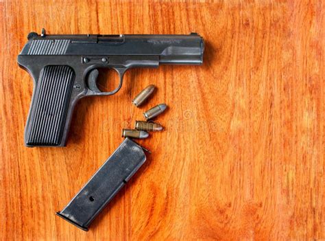 Gun And Bullets On Wood Table Stock Photo Image Of Kill Criminal