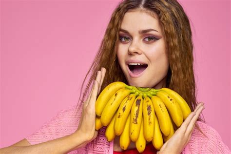 Premium Photo Beautiful Woman With Bananas In Hands