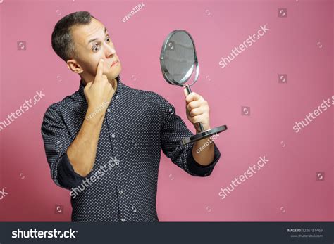 Surprised Young Man Looking Mirror On Stock Photo 1226151469 Shutterstock