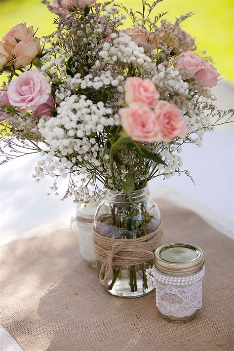 Rustic Baby S Breath And Rose Centerpieces Rose Centerpieces