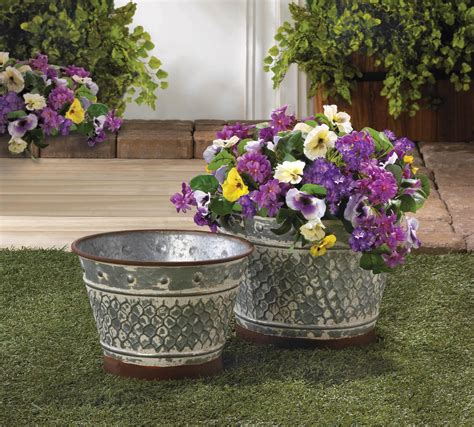 Now, my goal is to coordinate modern outdoor farmhouse planter pots in the rock bed, but avoid being the that house has to many cement pots and statuaries house. Set of 2 - Farmhouse Whitewashed Galvanized Metal Planters ...