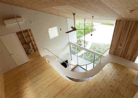Ym Design Offices Shawl House Has A Roof That Shelters A