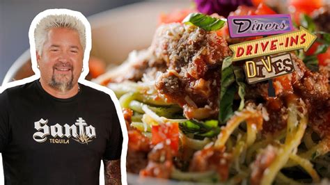 guy fieri eats bolognese pasta diners drive ins and dives food network youtube