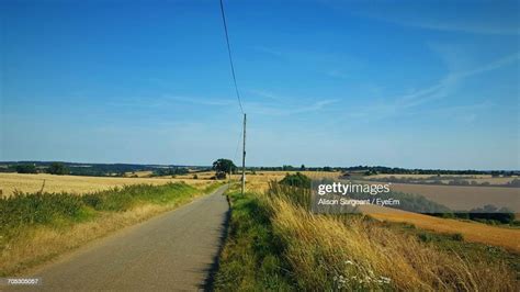 Dirt Road Passing Through Field High Res Stock Photo Getty Images