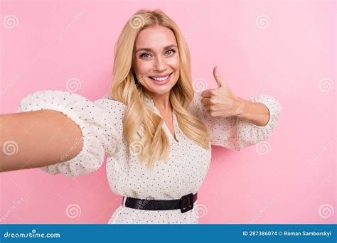 Photo Portrait Of Pretty Blonde Female Selfie Video Call Thumb Up Wear Trendy White Outfit