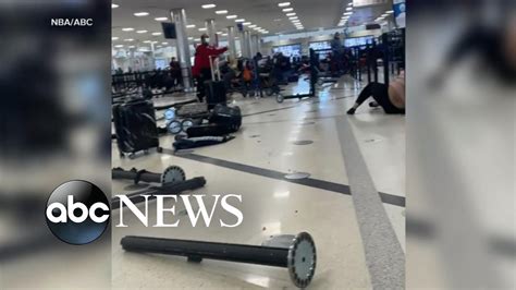 Accidental gun discharge sparks panic at Atlanta airport l GMA - YouTube