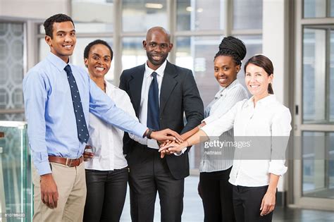Teamwork From A Group Of 5 Business People High Res Stock Photo Getty
