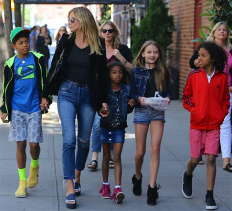 Heidi klum in roland mouret attends the creative arts emmy awards. HEIDI KLUM AND KIDS TAKE ON THE BIG CITY