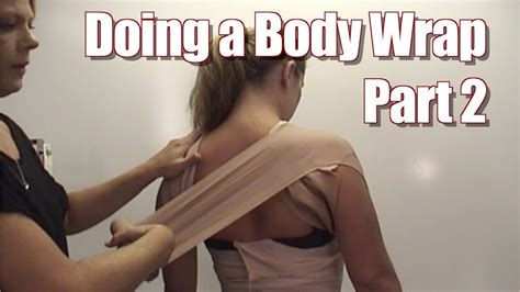 body wrap in review part 2 performing a body wrap for slimming youtube