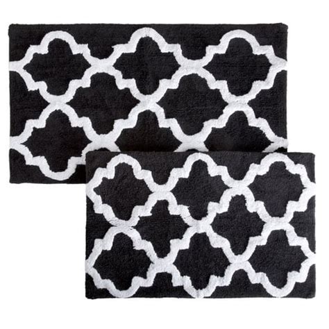 When it's time to wash up, bathroom in general, memory foam bath rugs promise a luxurious experience, while traditional cotton bath rugs offer a classic and cozy feel. 20 Gorgeous Black and White Bathroom Rugs Under $70