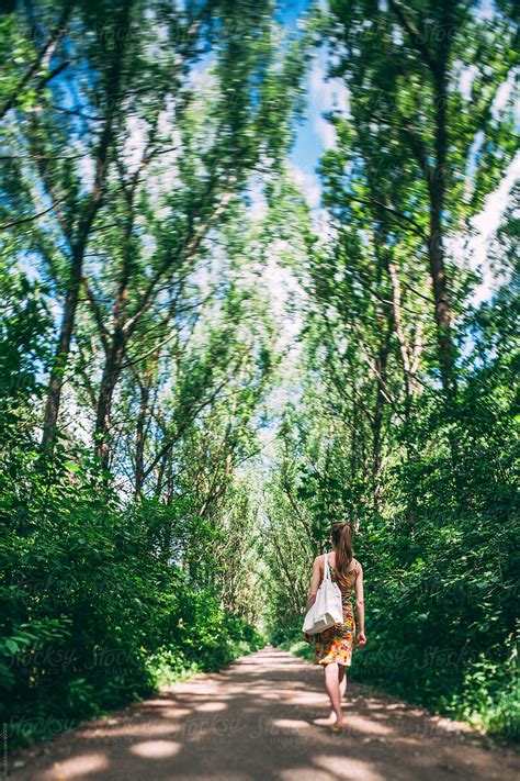 Woman On Summer Nature Walk In Park By Stocksy Contributor Ilya